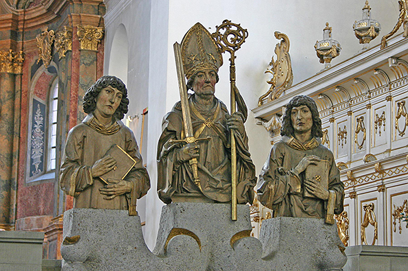 Sint-Kiliaan was een Ierse priester (ca. 640 - 689) die bisschop van W&uuml;rzberg werd. Hier op de foto een standbeeld in de Neum&uuml;nster-Kirche te W&uuml;rzberg te samen met Colonan en Totnan. Deze drie zijn de schutspatronen van de Franken.